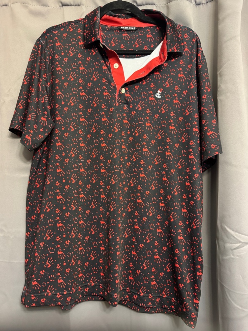Men's Black Polo with Red Handprint Pattern